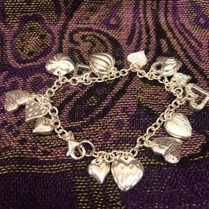 Sterling silver multi-heart charm bracelet